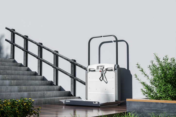 disability stair lift at building staircase for disabled people